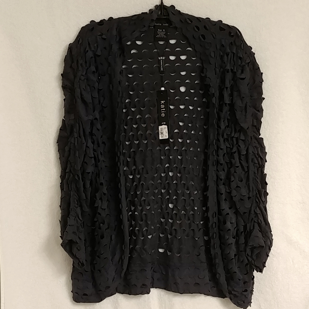 Perforated Jacket. New with tags